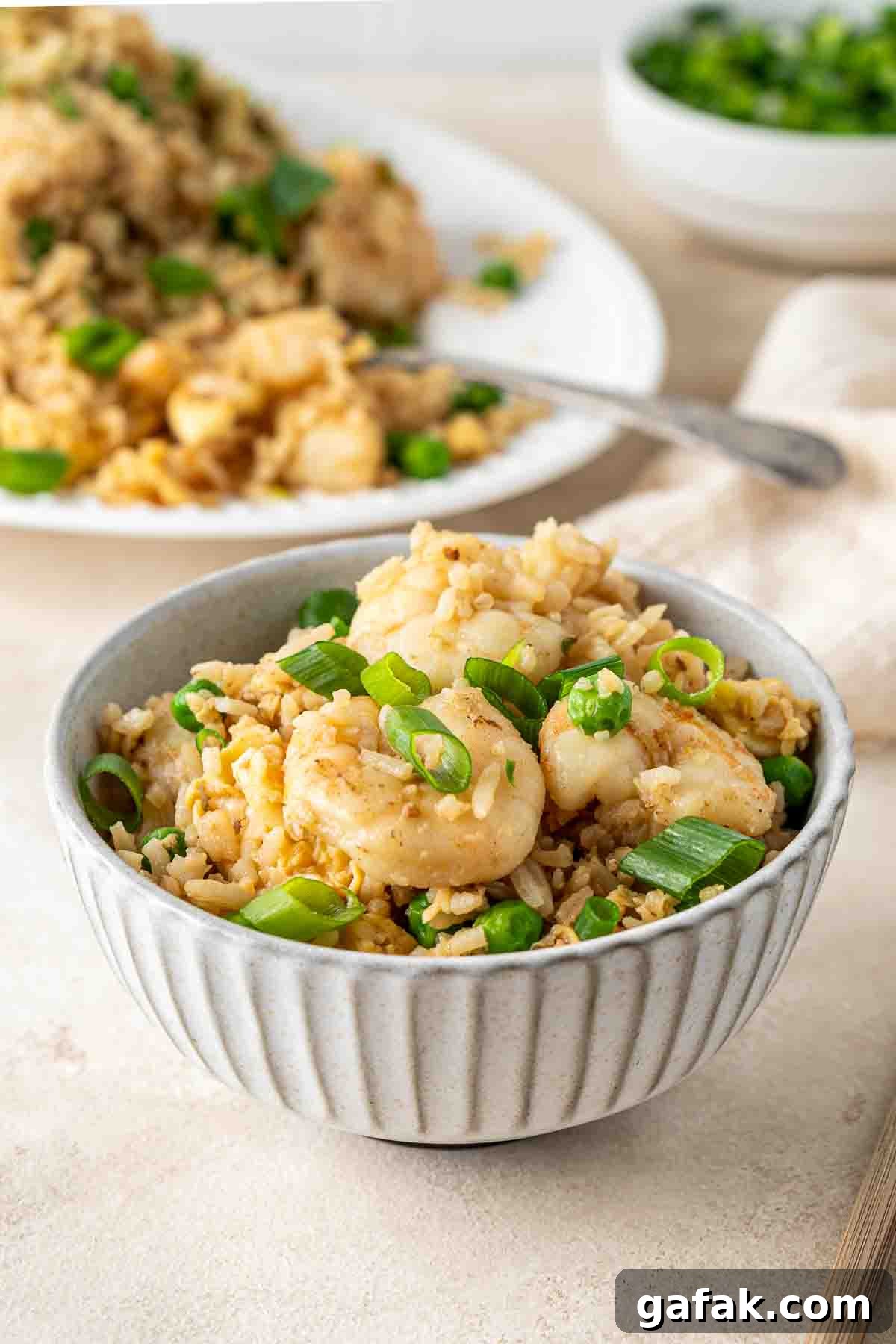 Garlic Prawn Egg Fried Rice Recipe for Quick Weeknight Meals 11 A bowl of egg fried rice with prawns.