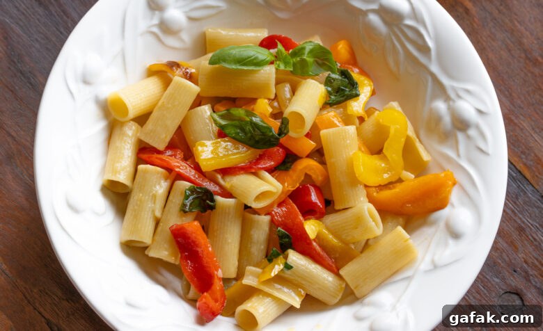 Roasted Red Pepper Sauce with Garlic, Basil & Pasta Recipe 8 Roasted bell pepper sauce with garlic, basil and rigatoni pasta served in a white pasta dish.