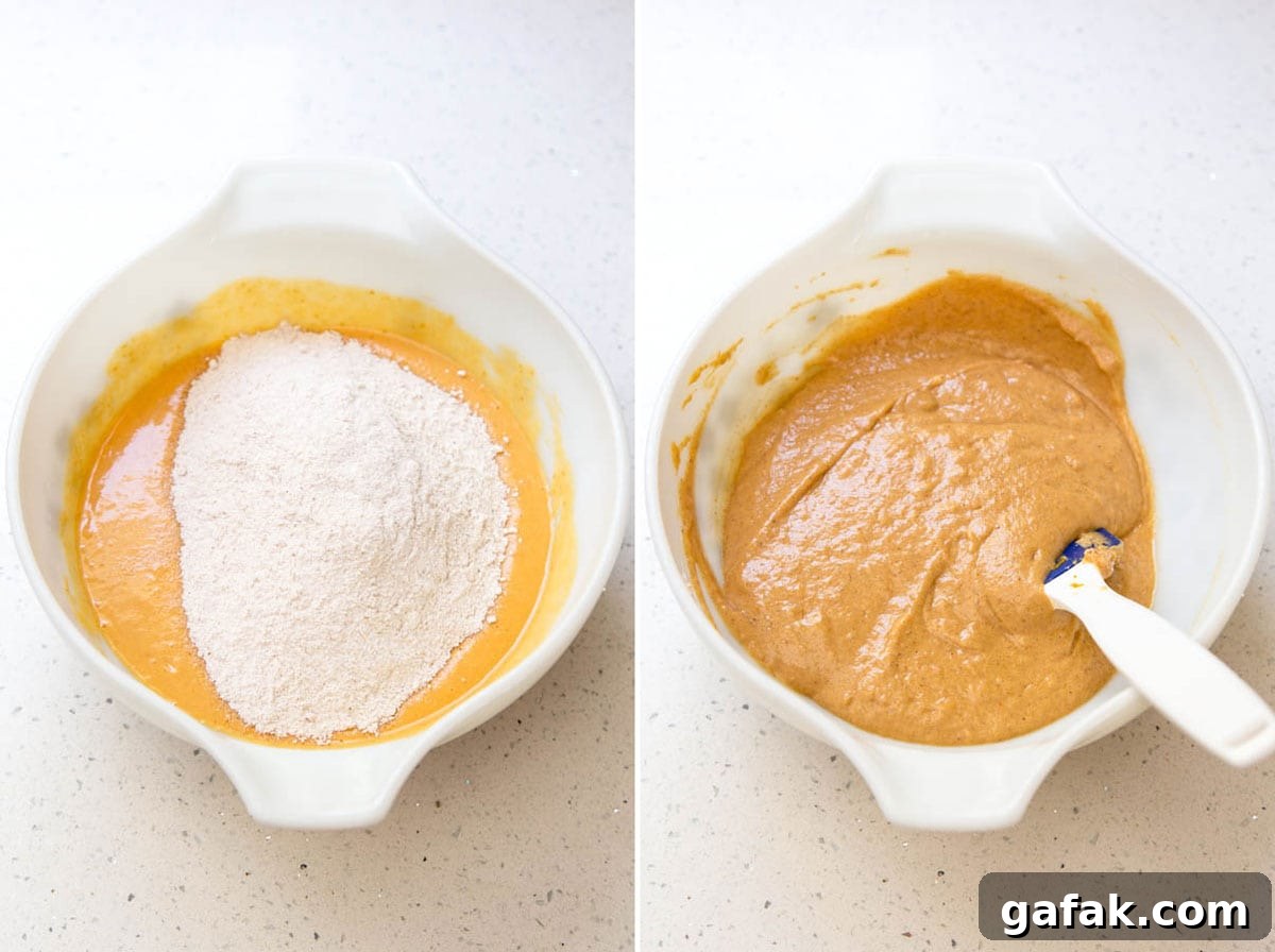 Adding dry ingredients to make pumpkin pie cupcakes.