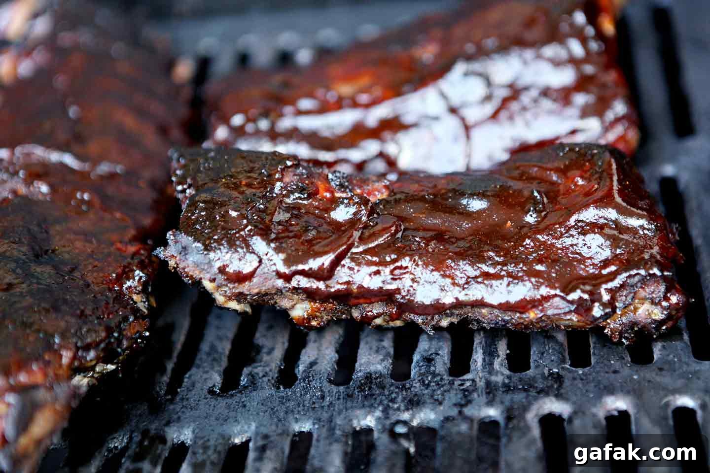 Dry rub ribs on the grill, after glazing