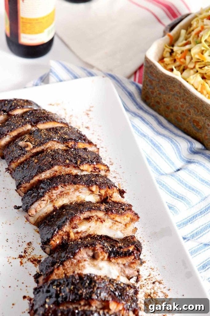 Close up of dry rubbed ribs on a platter, ready for eating