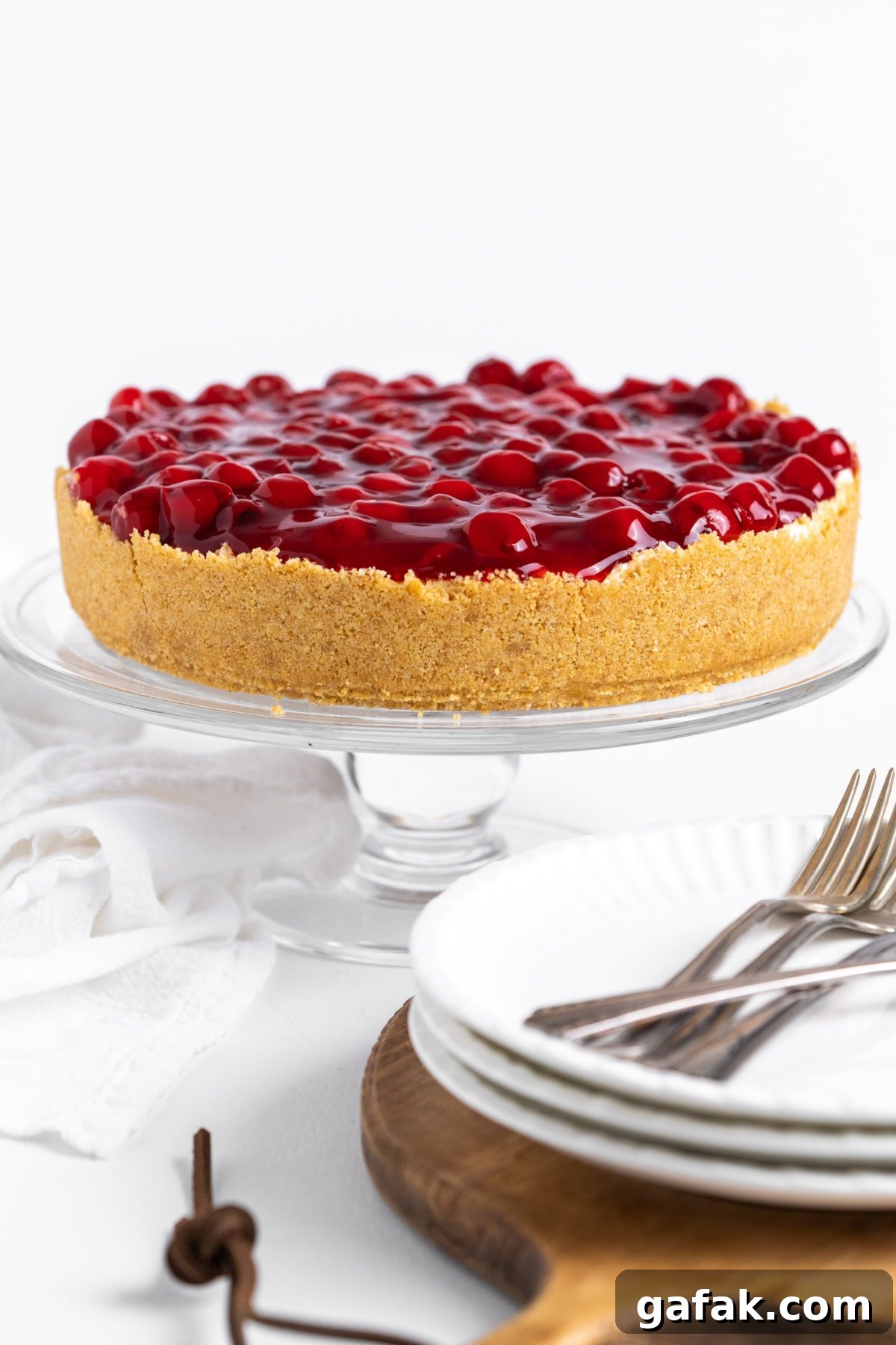 no bake cherry cheesecake on cake stand