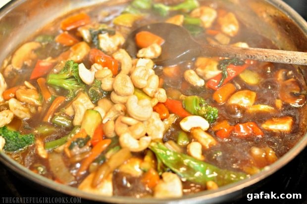 Cashews are added to the chicken veggie stir fry, after sauce thickens.