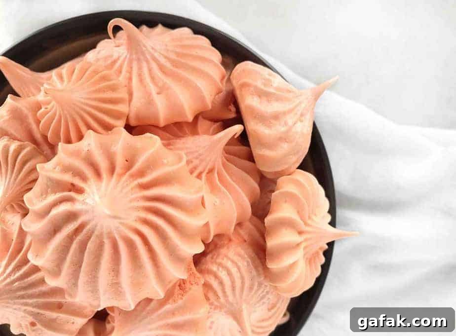 Crisp Pumpkin Spice Meringue Cookies — Light Fall Dessert 5 close up of meringue cookies in bowl