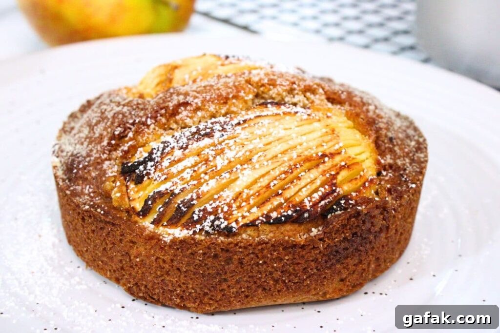 closeup of uncut homemade air fryer apple cake