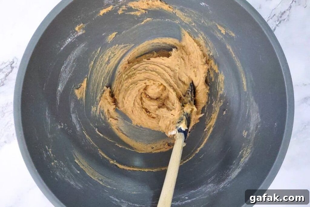 cream together butter and brown sugar before mixing in wet ingredients