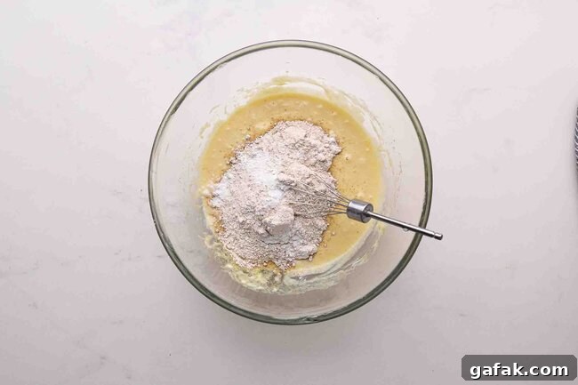 Flour and wet ingredients in a bowl.