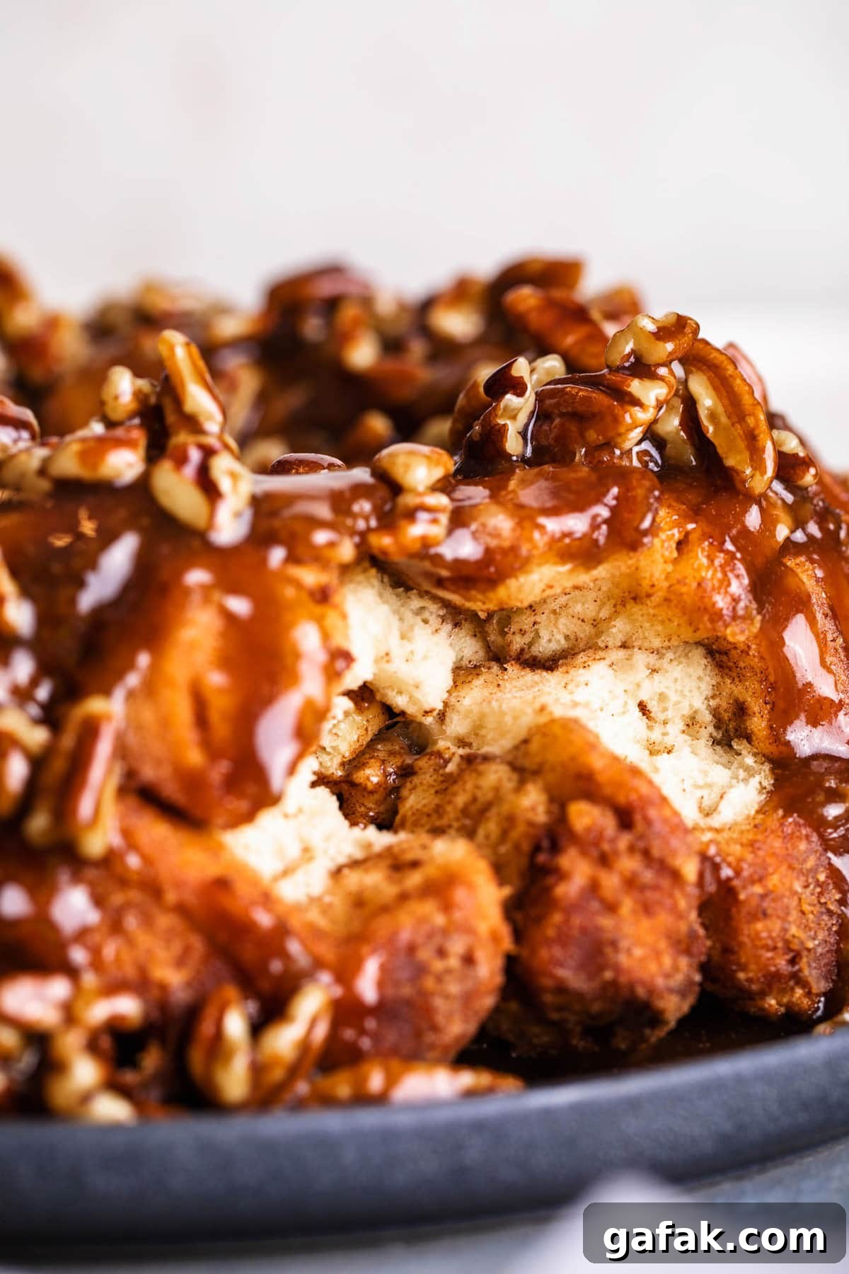 cinnamon roll monkey bread with pecan caramel sauce