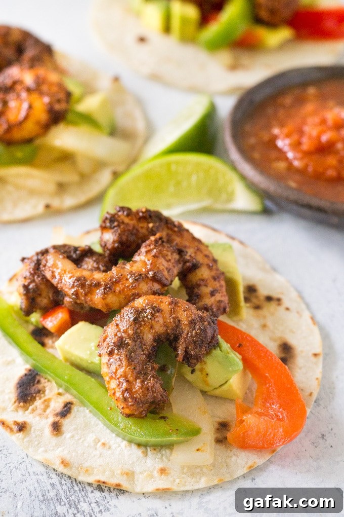 Shrimp fajitas on a table.