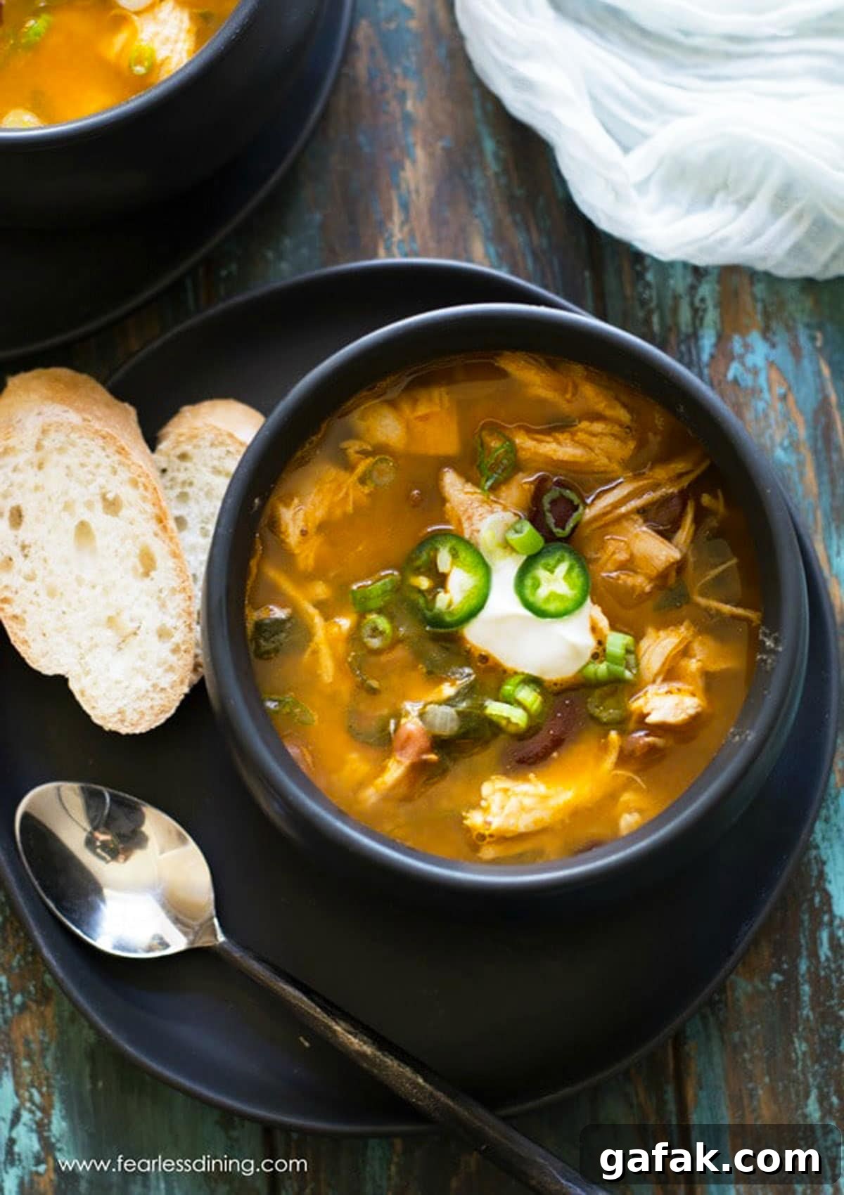 The top view of a bowl of Mexican chicken soup.