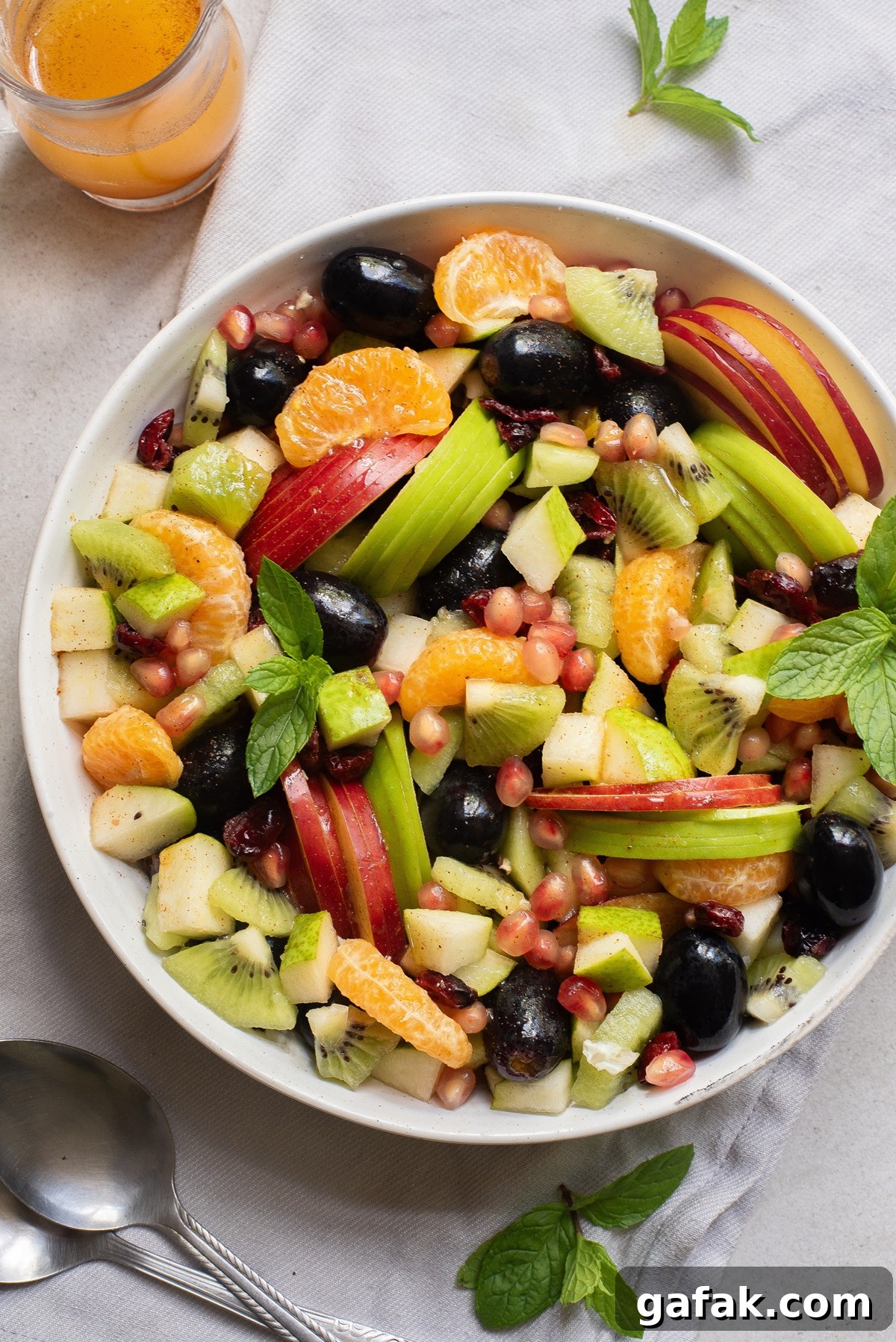 Round bowl with fruit in it.