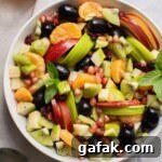 Round bowl with fruit in it.