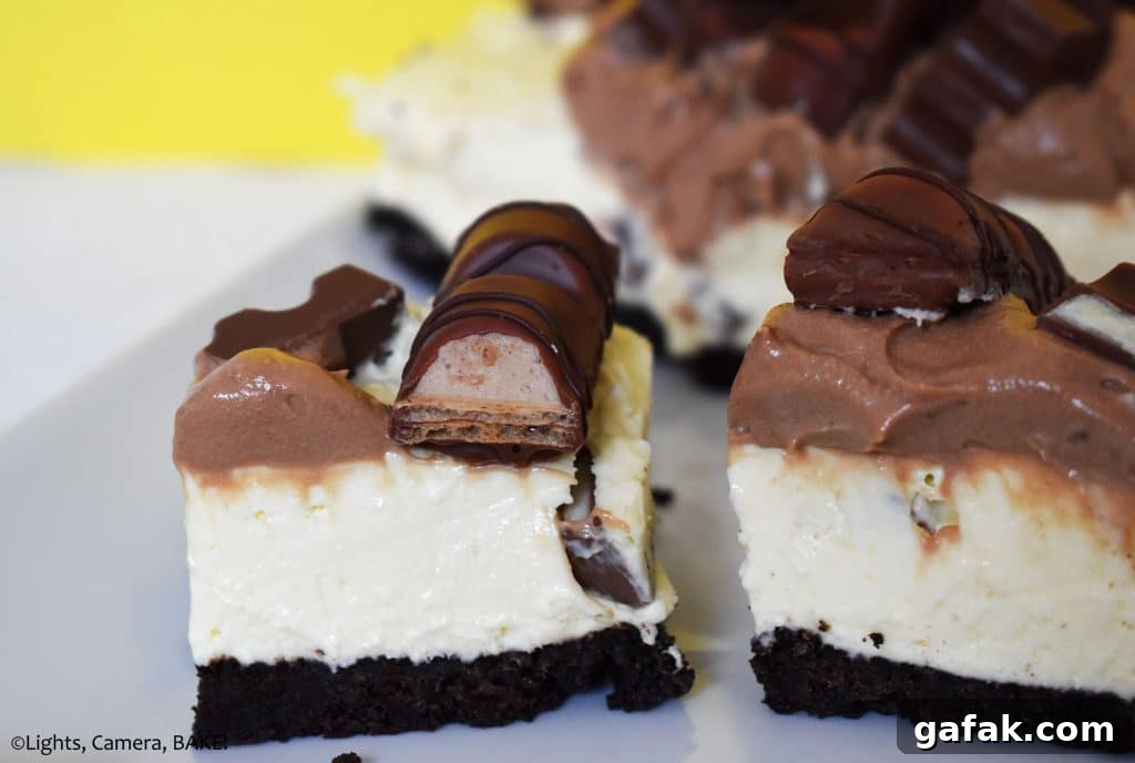Slice of Kinder Bueno cheesecake on a plate.