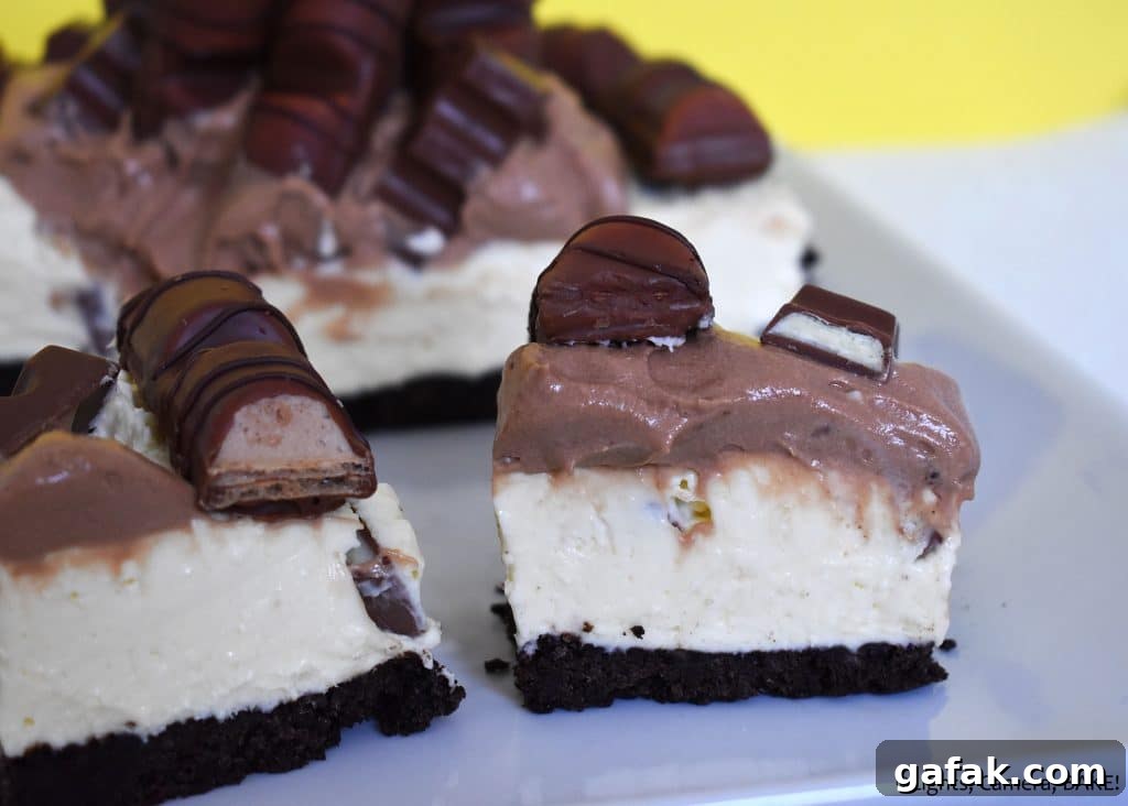 Kinder chocolate and Kinder Bueno cheesecake on a plate.