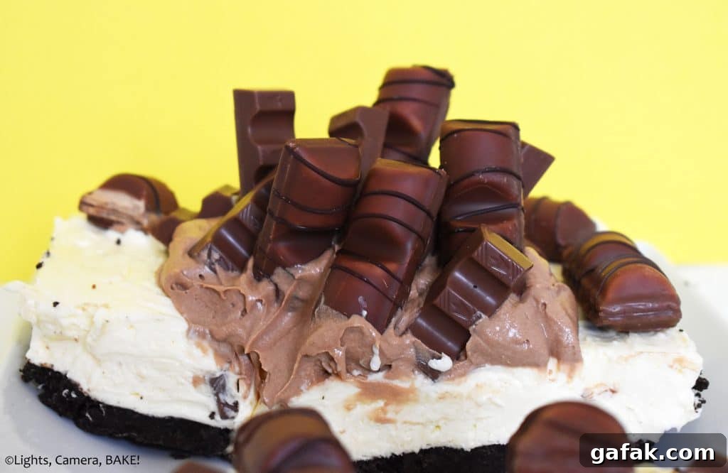 Kinder Bueno and Kinder chocolate on a vanilla cheesecake.