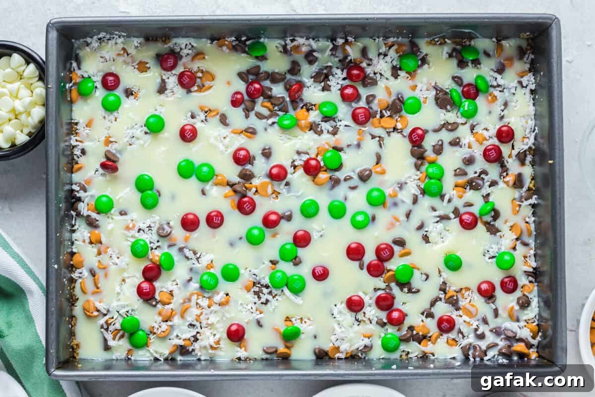 christmas 7 layer magic cookie bars before baking