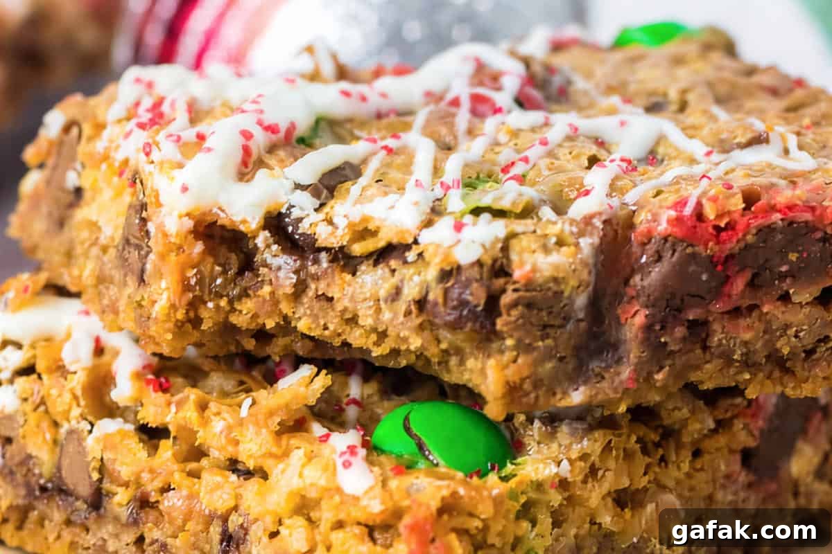 closeup of a bitten christmas 7 layer magic bar.