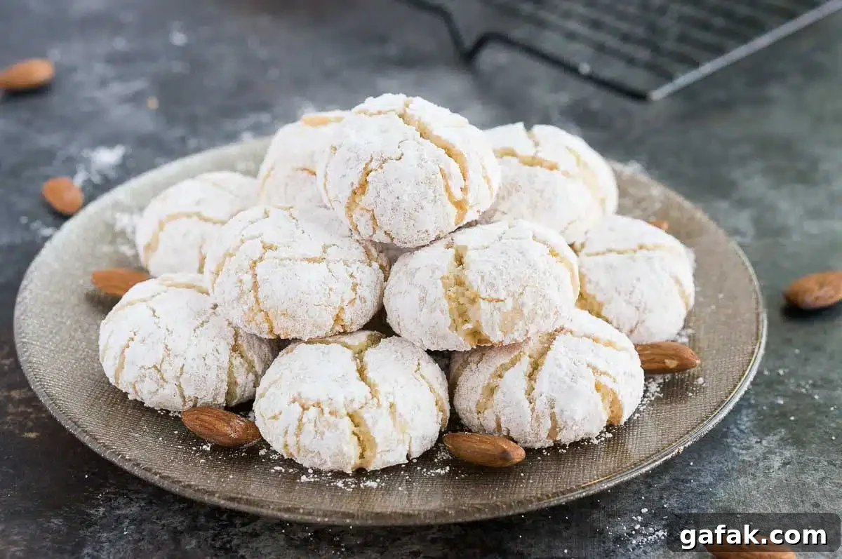 stacked gluten-free almond cookies on a plate