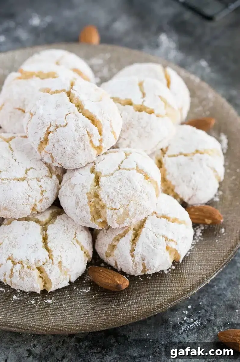 close up shot of chewy amaretti cookies on a plate