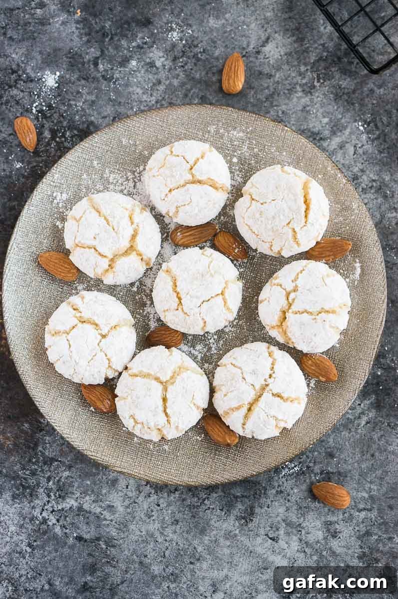 gluten-free amaretti cookies on a silver plate