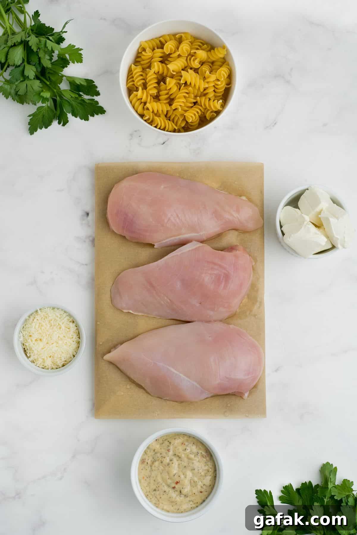 Garlic Parmesan Chicken Pasta in the Crockpot — Creamy Slow-Cooker Recipe 3 Ingredients to make slow cooker garlic parmesan chicken on the table before preparing.