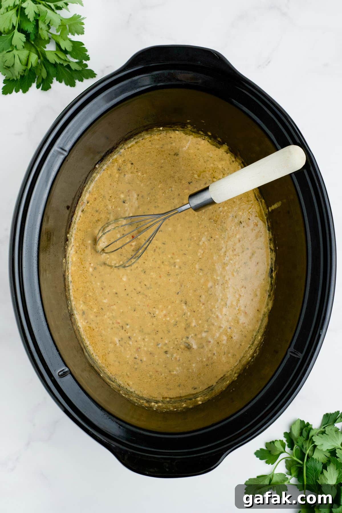 Garlic Parmesan Chicken Pasta in the Crockpot — Creamy Slow-Cooker Recipe 7 Sauce whisked together in a slow cooker.