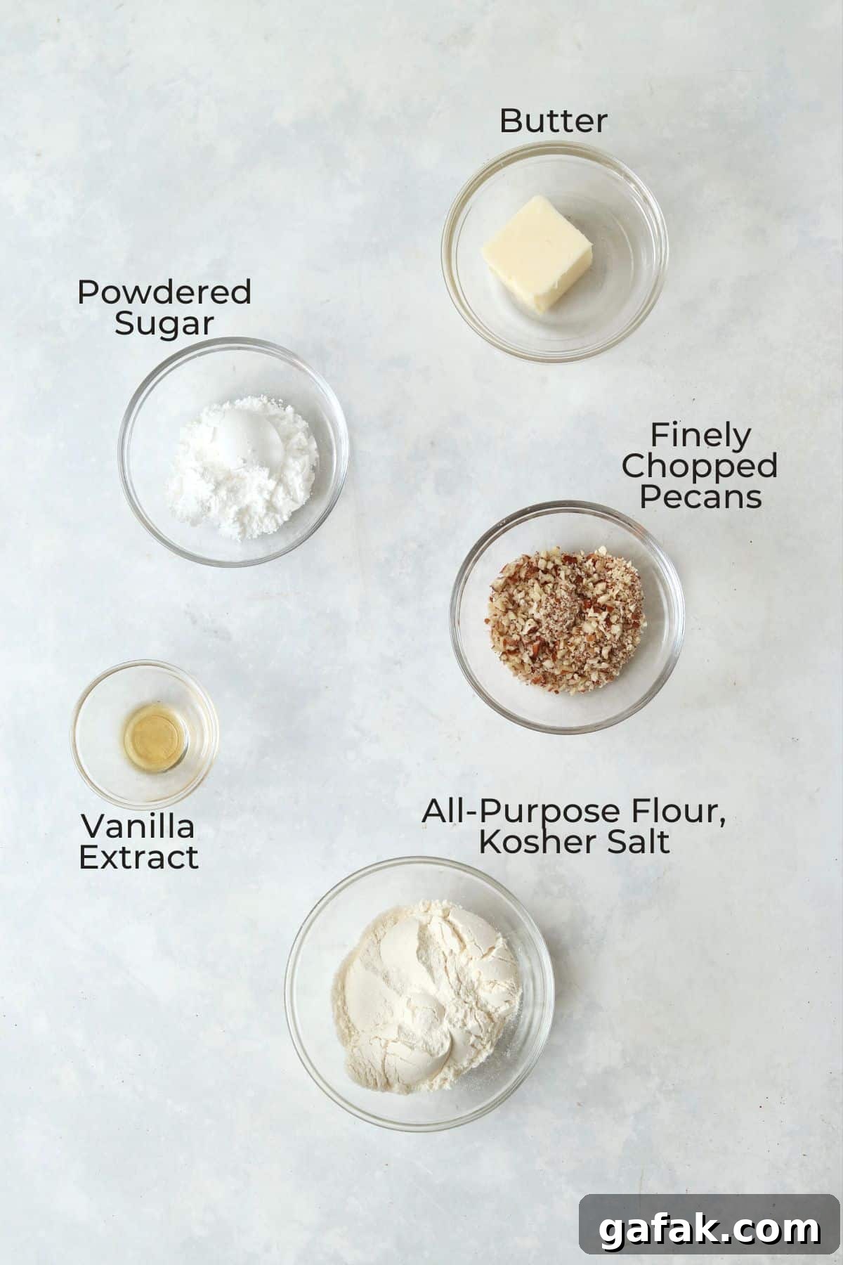 Ingredients to make small batch pecan snowball cookies.
