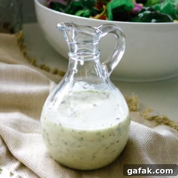 House salad dressing inside a clear jar.