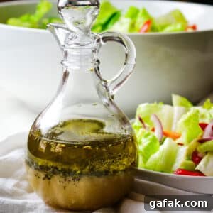 salad dressing in a clear bottle with salad dressing on the right side.