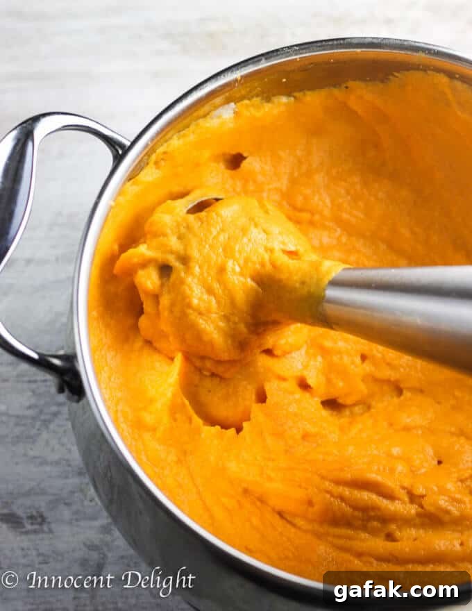 Maple Mashed Sweet Potato with Candied Pecans, Craisins and Chives