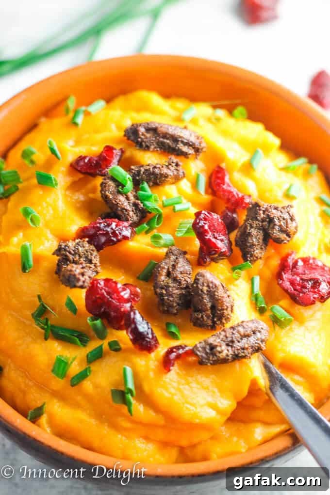 For this Maple Mashed Sweet Potatoes with Candied Pecans, Craisins and Chives