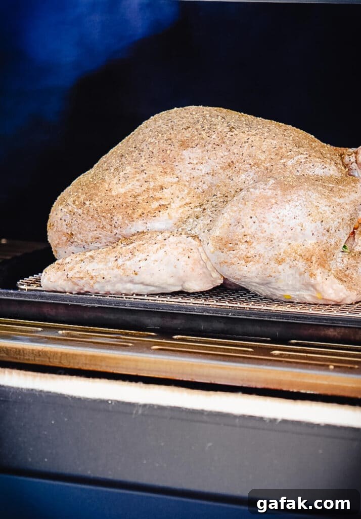 How to Smoke a Turkey: Step-by-Step Guide for Juicy Results 10 uncooked turkey inside of a smoker