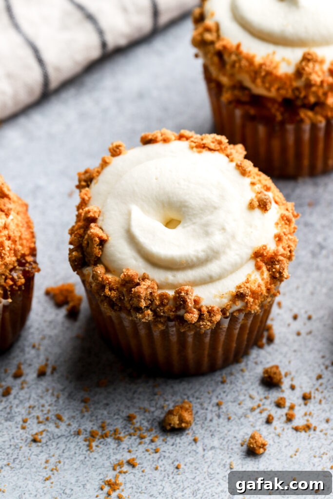 spice cupcakes with apple pie filling and cream cheese frosting and streusel topping