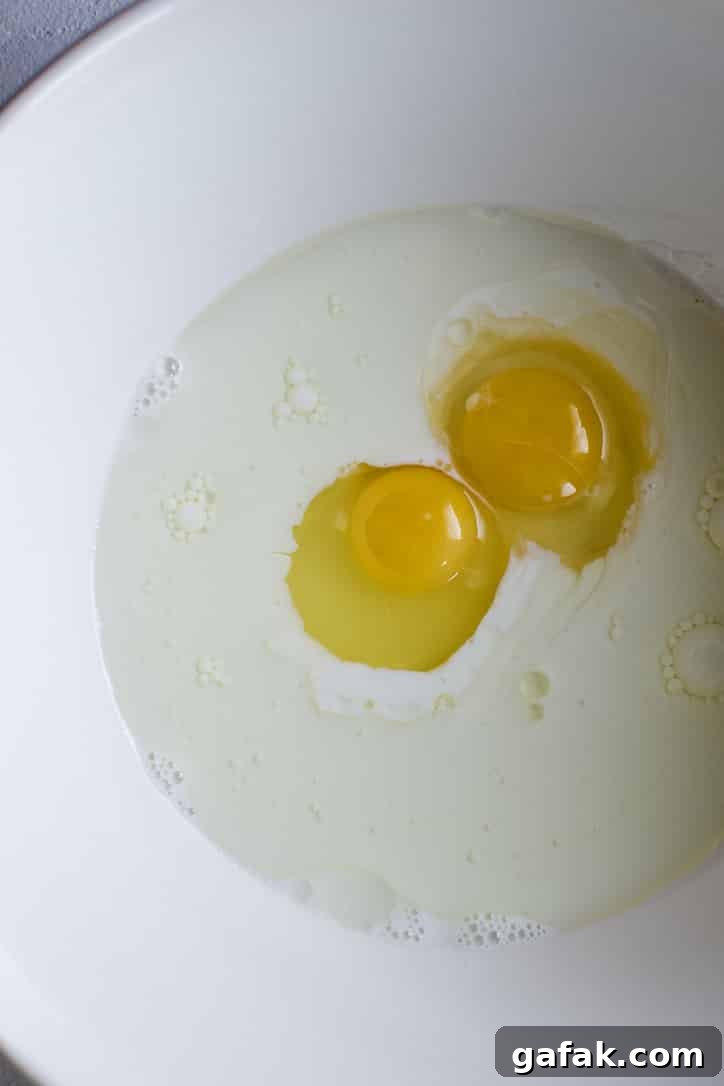 Eggs, Milk, and Oil in a bowl.