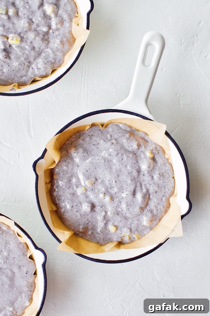 Blue Cornbread batter in a mini skillet.
