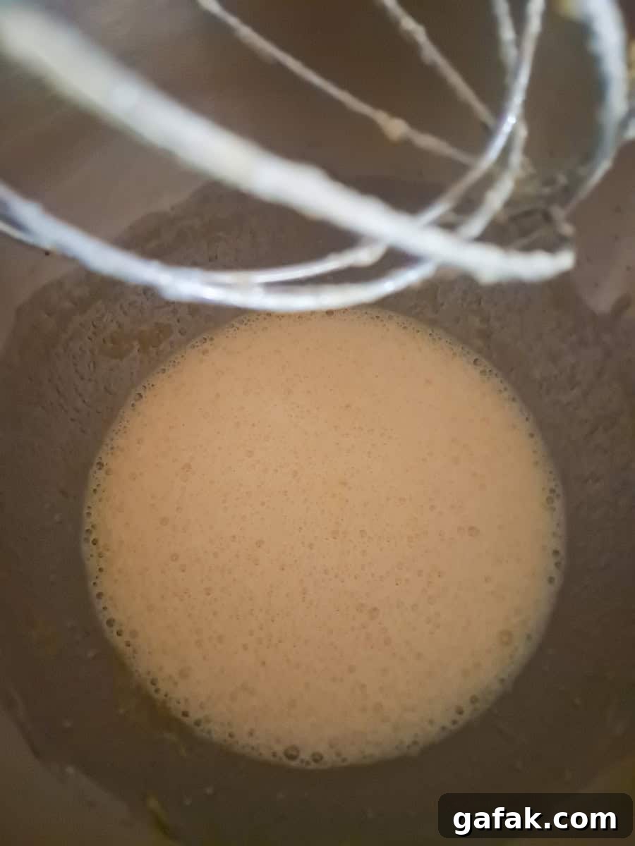 Amish Oatmeal Pie Recipe (Pecan-Style Mock Pie) 3 beating the liquid mixture for mock pecan pie.