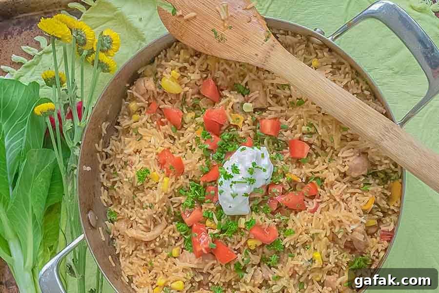taco rice chicken dinner in a skillet