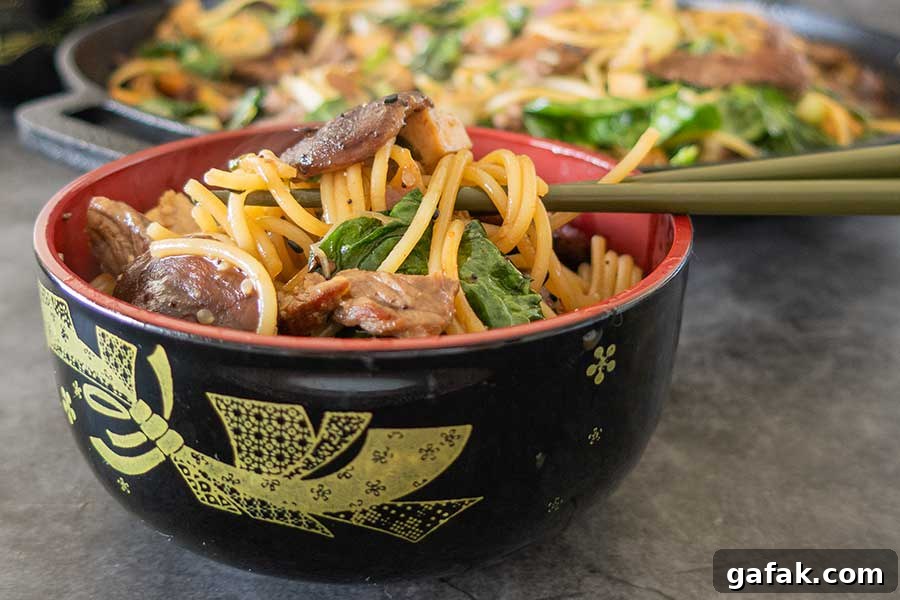sukiyaki noodle salad in a bowl with chopsticks