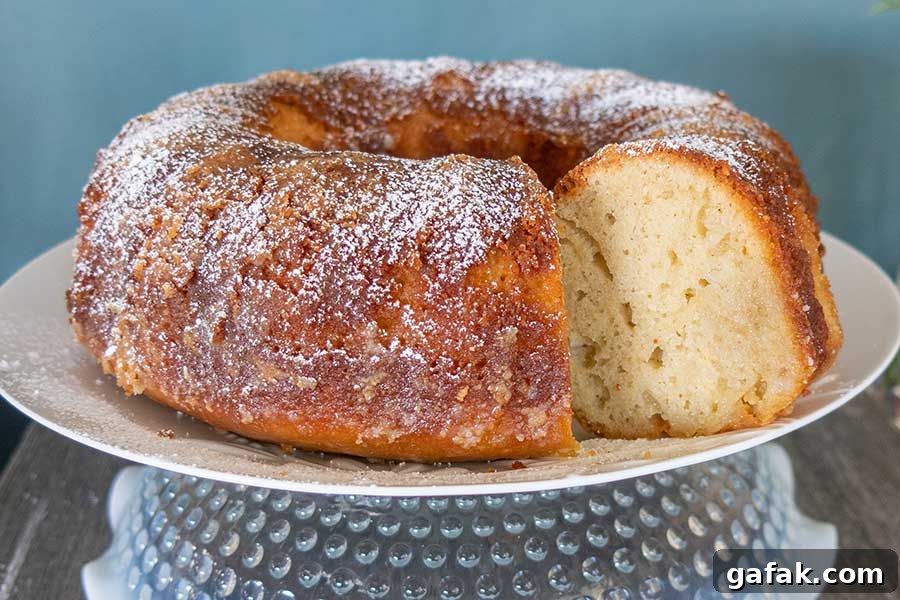 caribbean rum cake on a cake platter, gluten free