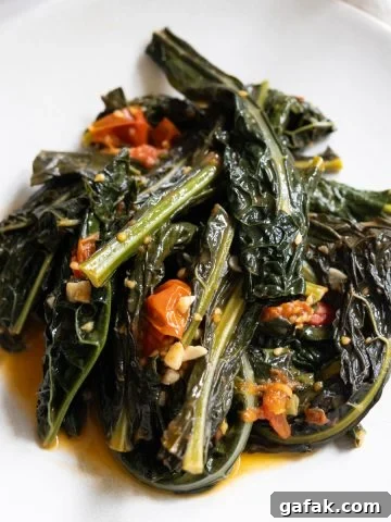 finished lacinato kale recipe braised with cherry tomatoes and garlic