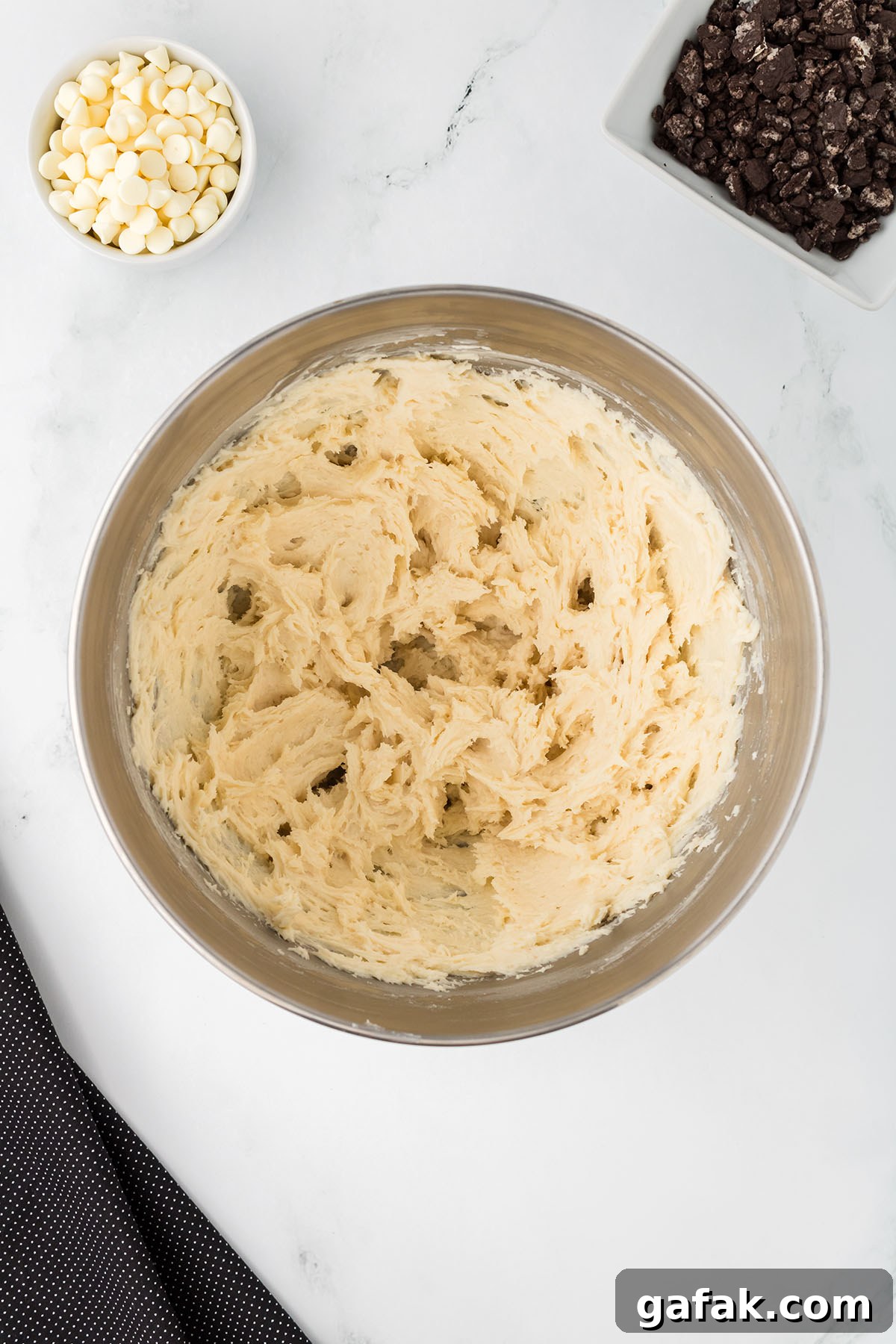 Butter, sugar, cream cheese, sour cream, flour, salt, and vanilla in a mixing bowl.
