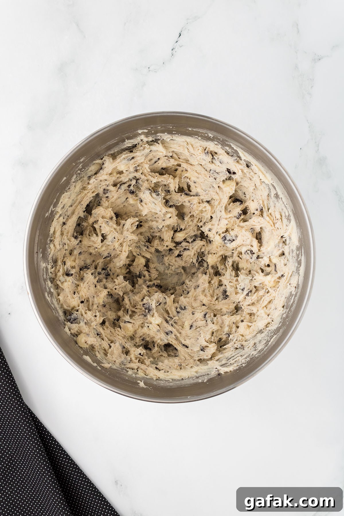 Cookie dough in the mixing bowl.