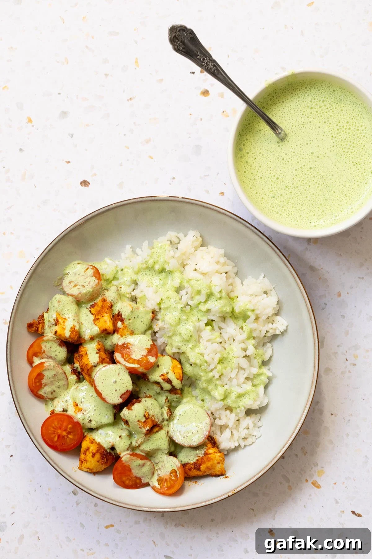 Yogurt mint sauce topping chicken and rice