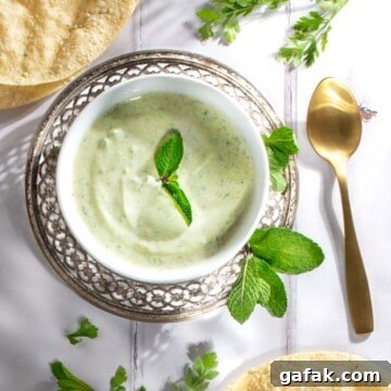 Indian mint sauce in a white bowl.