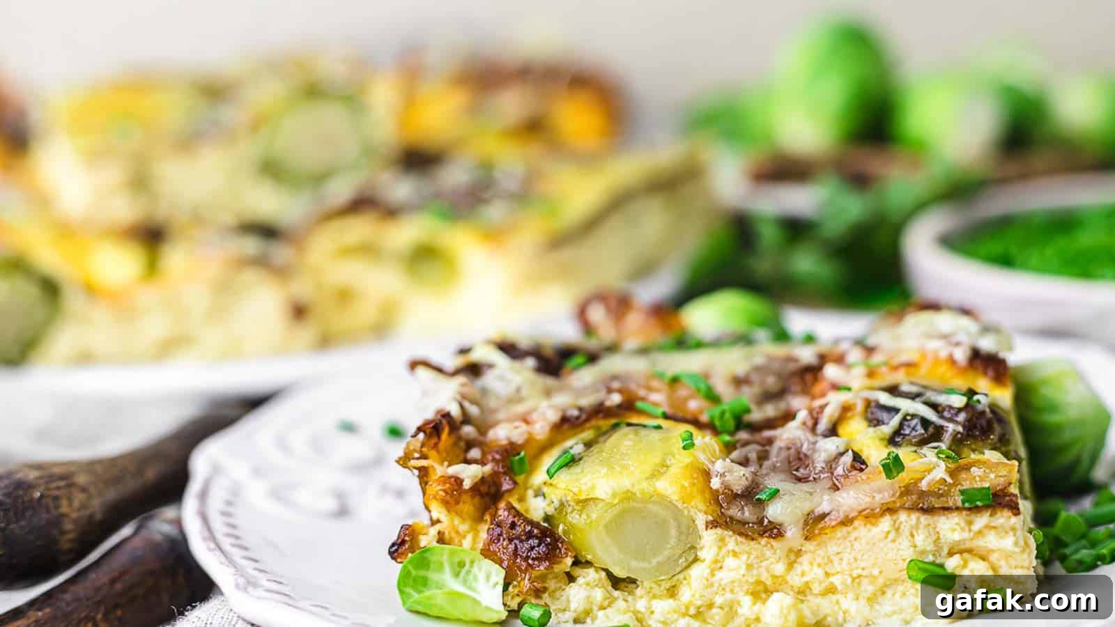 21 Packed Lunch Ideas to Make Midday Meals Exciting Again 11 Brussel Sprouts Casserole piece on a white plate.