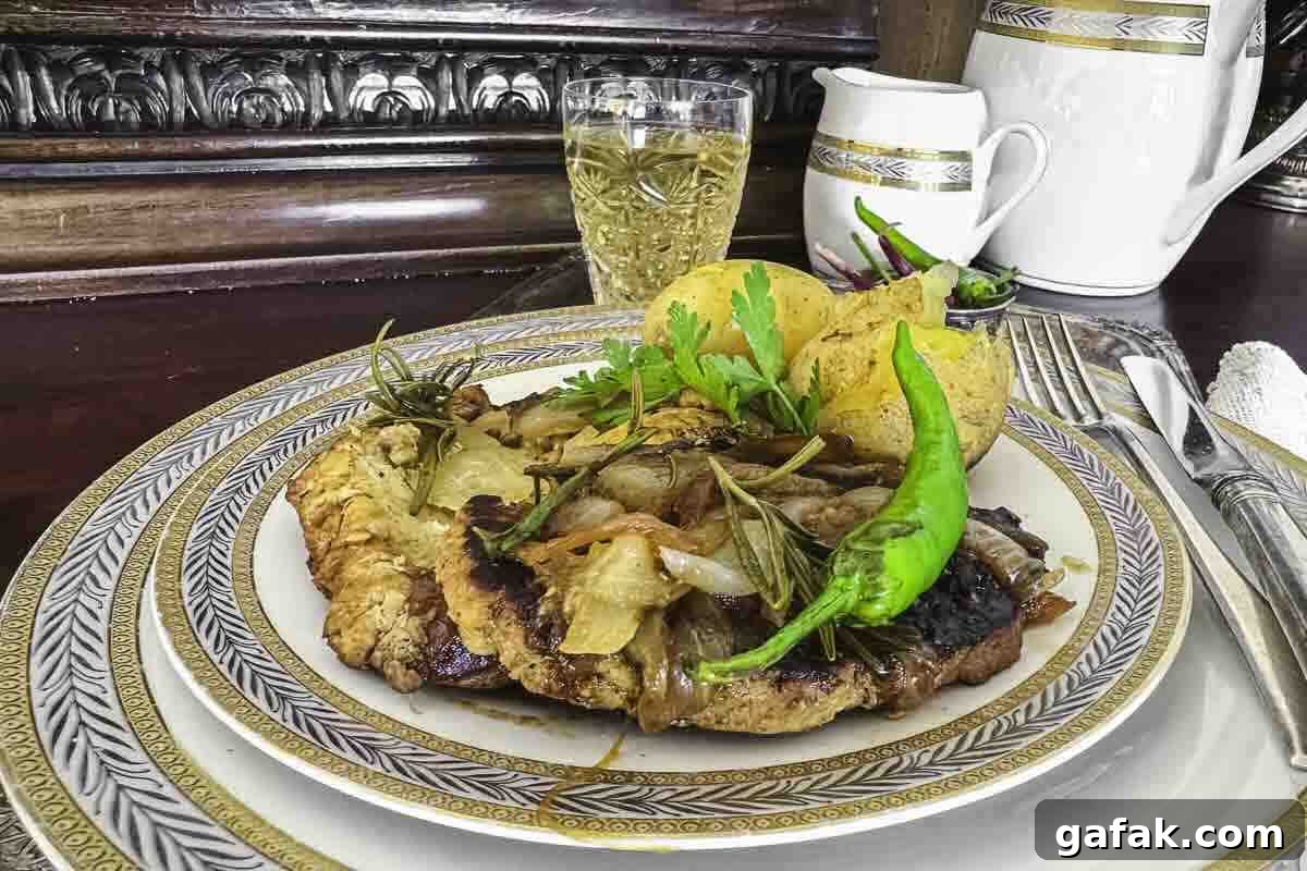 21 Packed Lunch Ideas to Make Midday Meals Exciting Again 23 A plate of pork fillet meal garnished with onions.