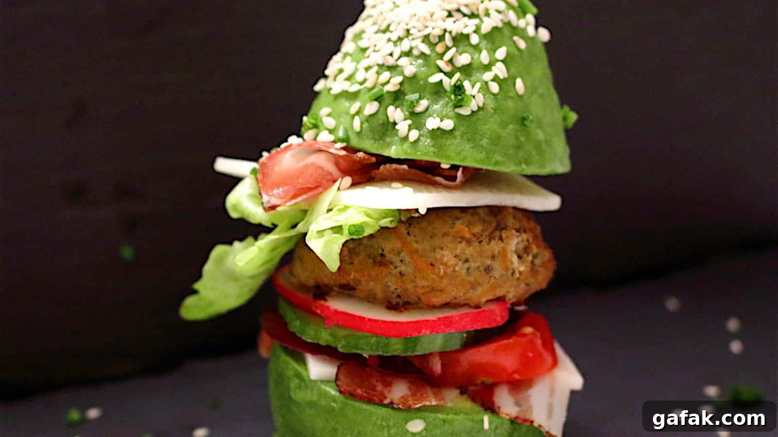 21 Packed Lunch Ideas to Make Midday Meals Exciting Again 6 A burger stuck in between avocado as buns.