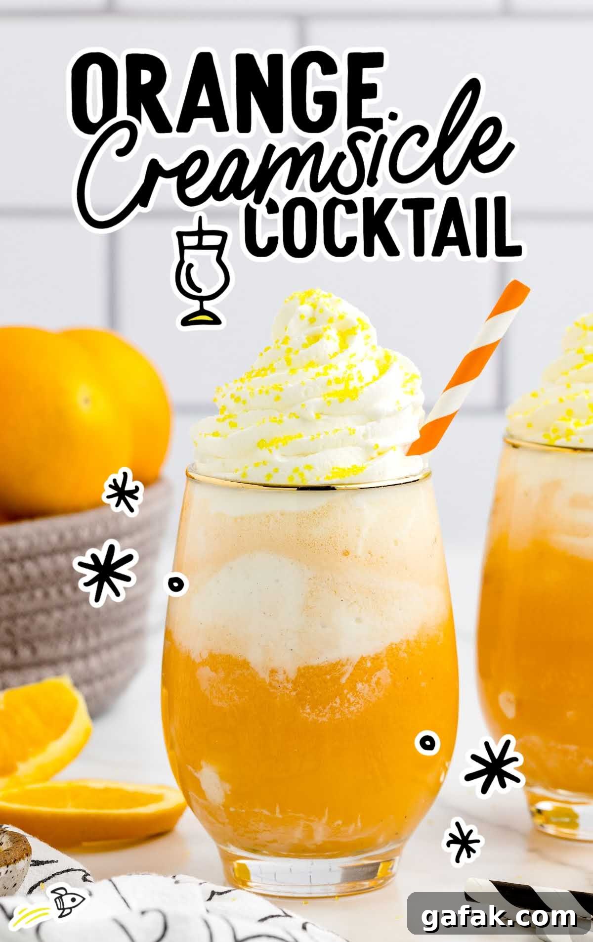 a close up shot of Orange Creamsicle Cocktails in a glass
