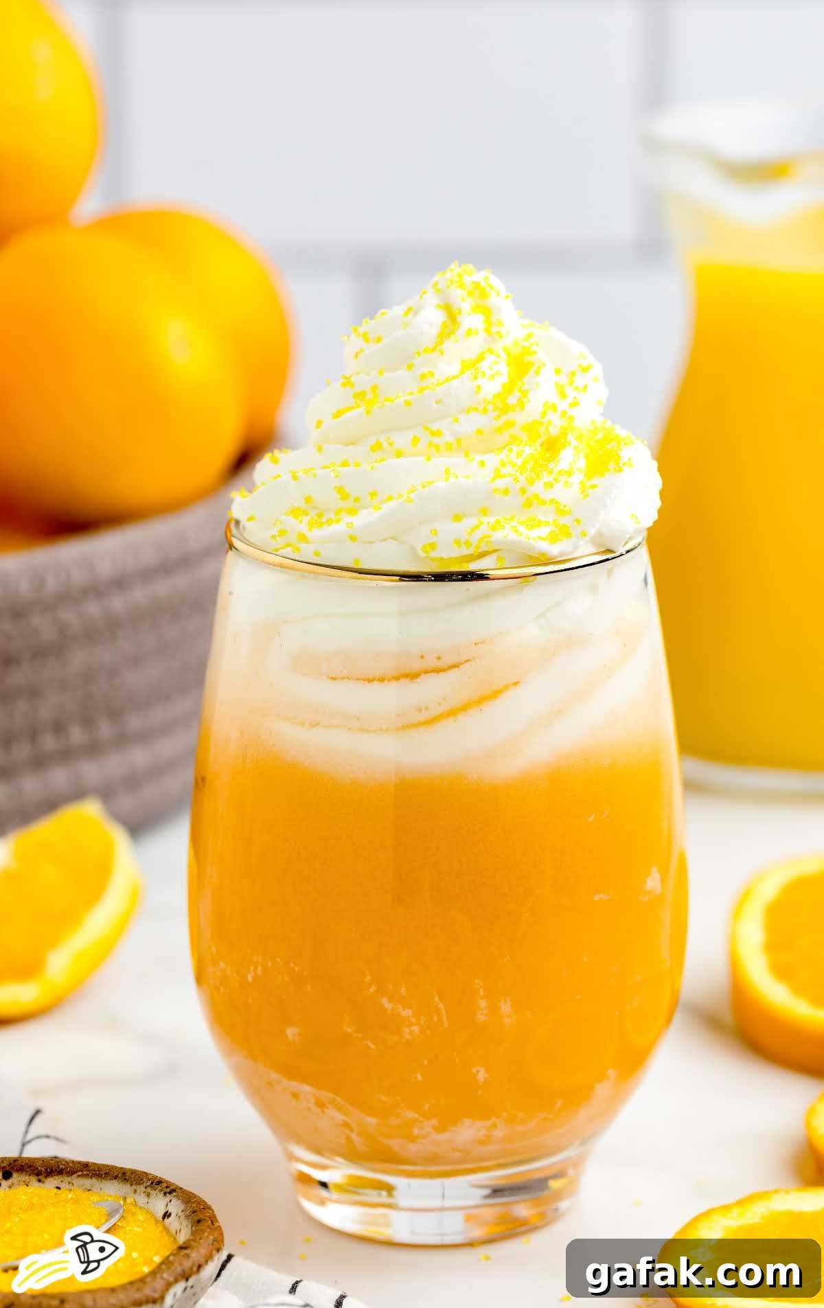 a close up shot of Orange Creamsicle Cocktail in a glass