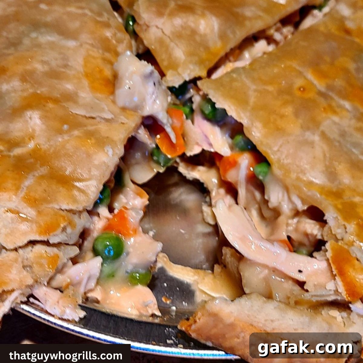 Smoked turkey pot pie in a metal pie tin